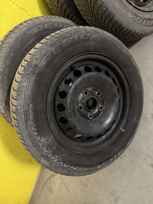 195/65/15 cauciucuri cu tot cu jante +capace VW