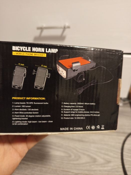 Lampă multifuncțională pentru bicicletă cu claxon și suport de telefon