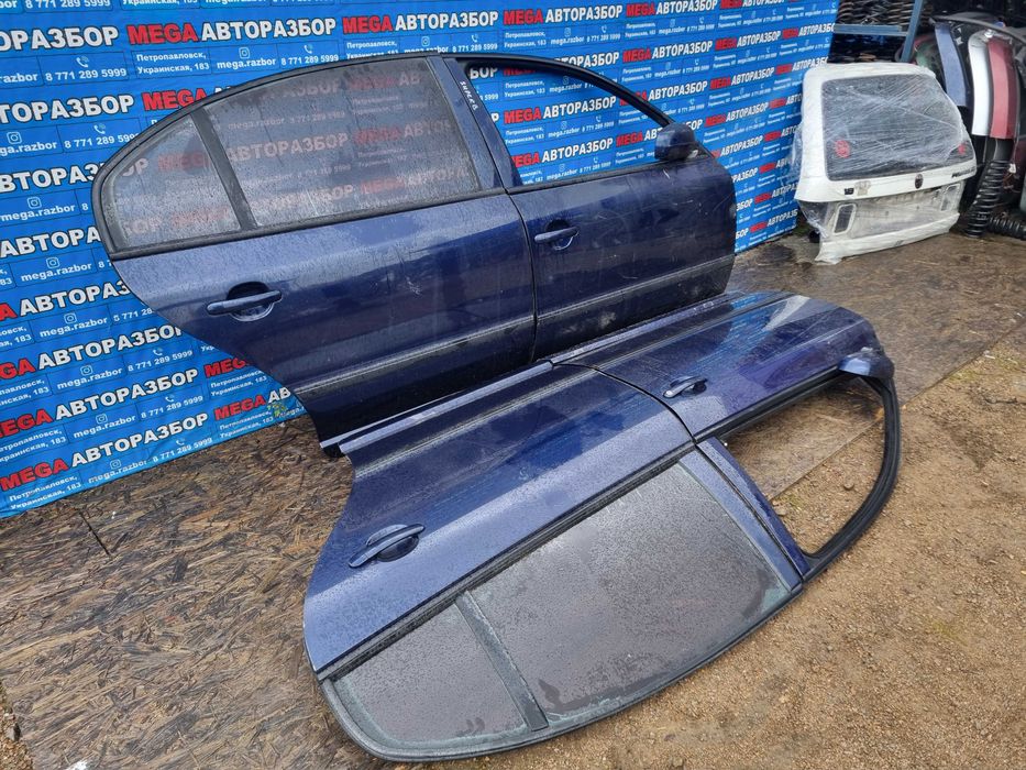 Двери на Skoda SuperB