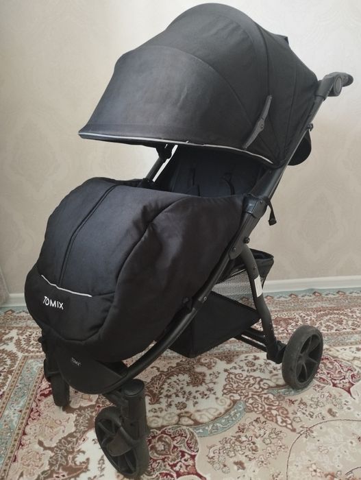 Продам коляску Tomix оригинал в отличном состоянии