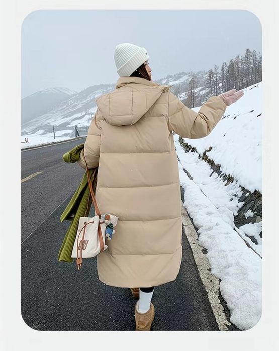 Продам пуховик длинный