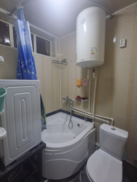 Самарканд шахар Гагарина кучасида 4этажли дом 1-этаж под офис квартира