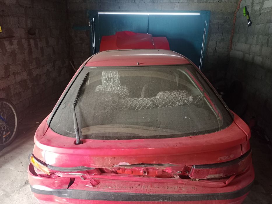 Mazda 323 красная