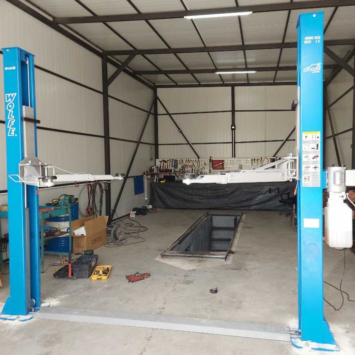 Подемник 4т WOLFE Profi line окомплектован с масло и анкери