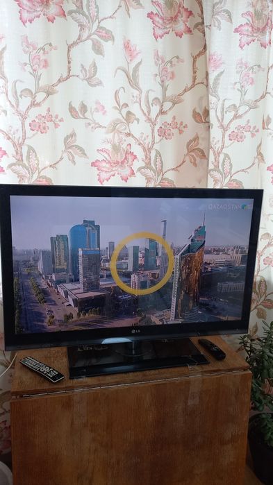 Телевизор LG ұсталған
