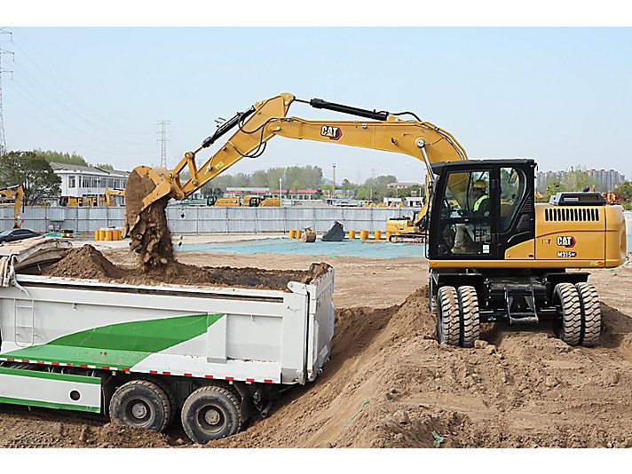 Колесный экскаватор CAT M315GC