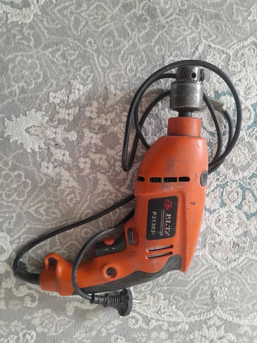 Ударный дрель б/у