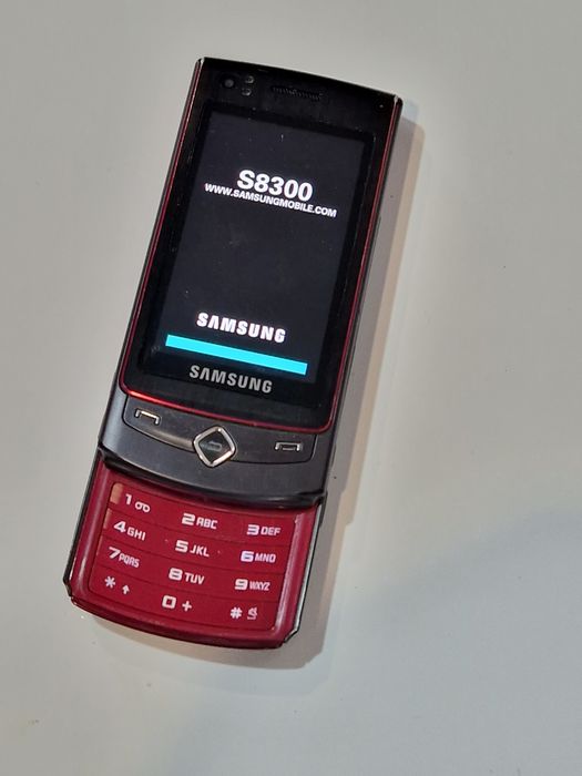 Super telefon Samsung - S8300 cu încărcător original