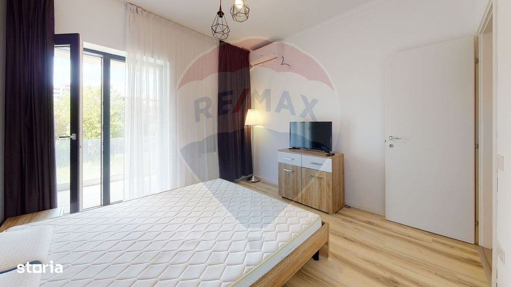 Apartament luminos cu 2 camere, terasa de 14 mp si loc de parcare