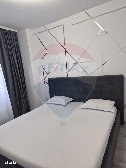 Apartament luminos cu 2 camere, mobilat complet si cu loc de parcare