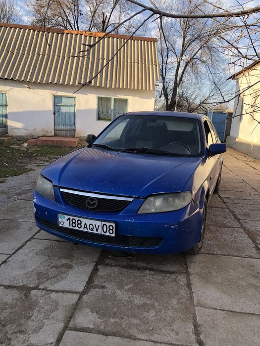 Мазда 323 ф кузов 2003