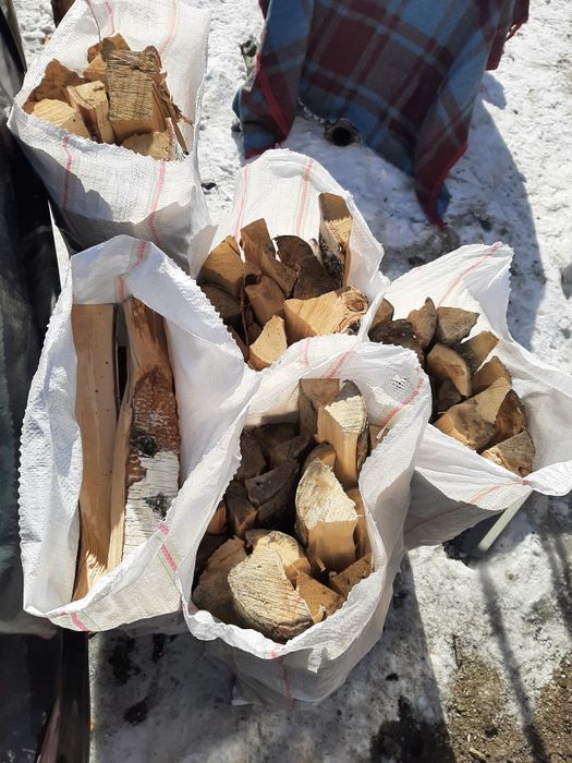 Дрова в мешках рубленные