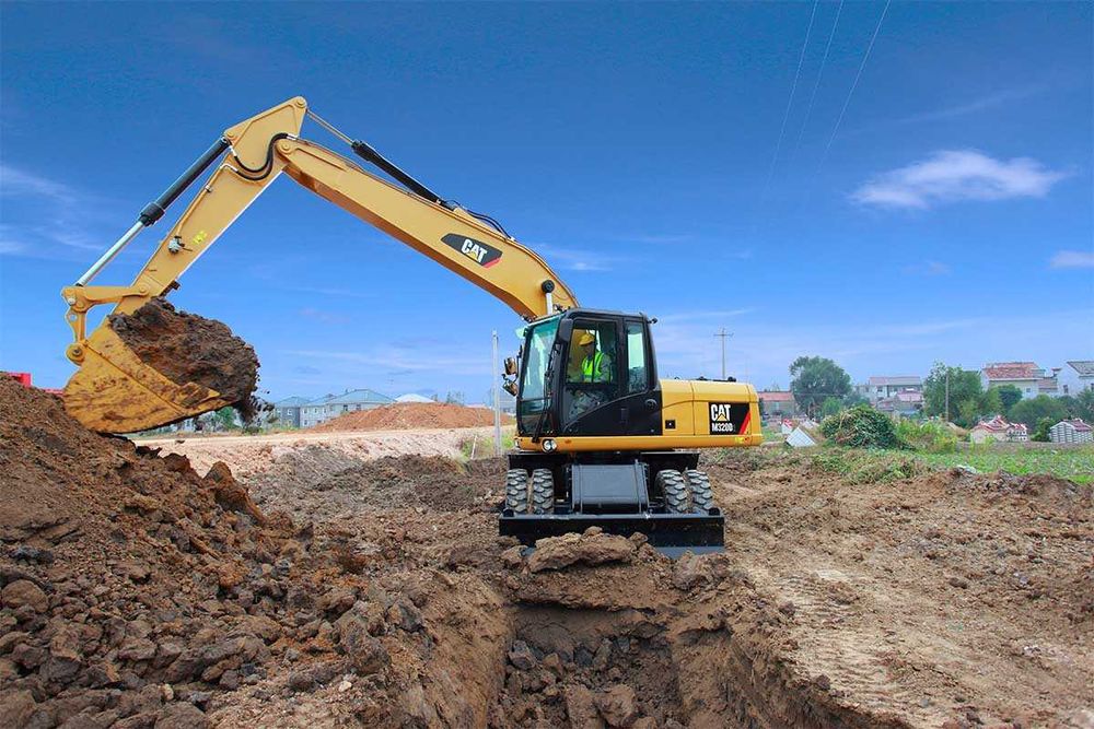 Колесный экскаватор CAT [M320] 1.19м³