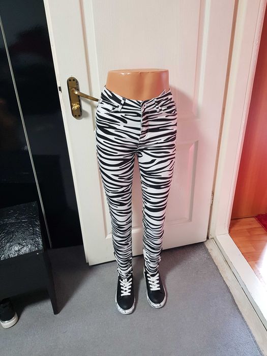 Blugi animal print s noi