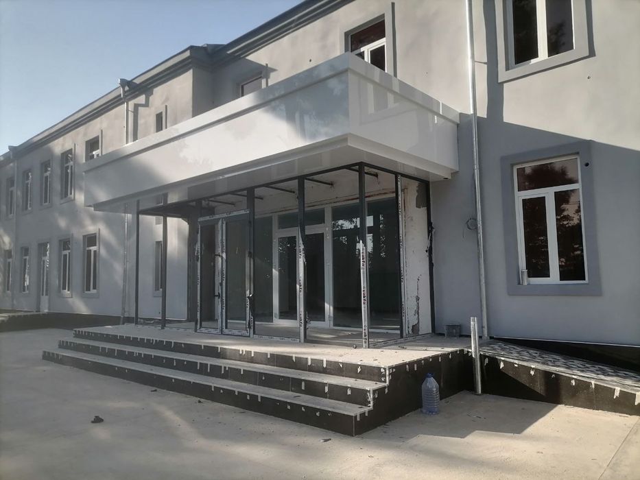 Клиникага мулжалланган бино