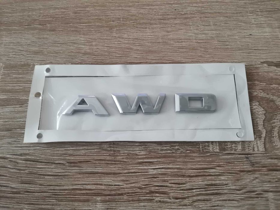 сребристо лого Cadillac AWD