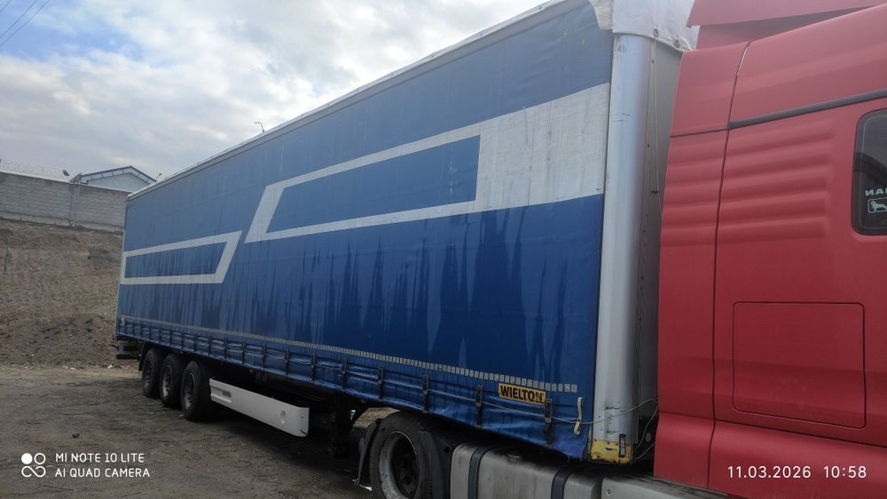 2015 й. мега прицеп сотилади. холати аъло. дамкратлик. том тенти янги