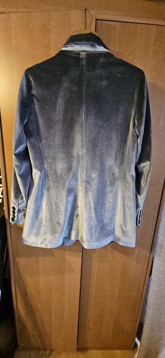 Продам брючный костюм новый