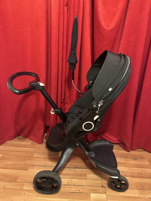 Carucior Stokke stare excelenta umbrela si geanta negru