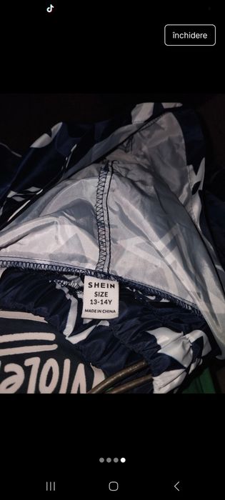 Vând costum de ploaie 13,14 ani