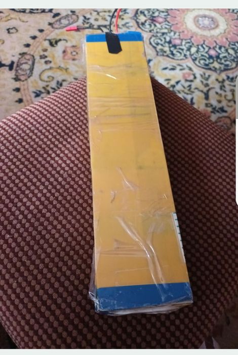 Incarcator  si acumulator trotineta