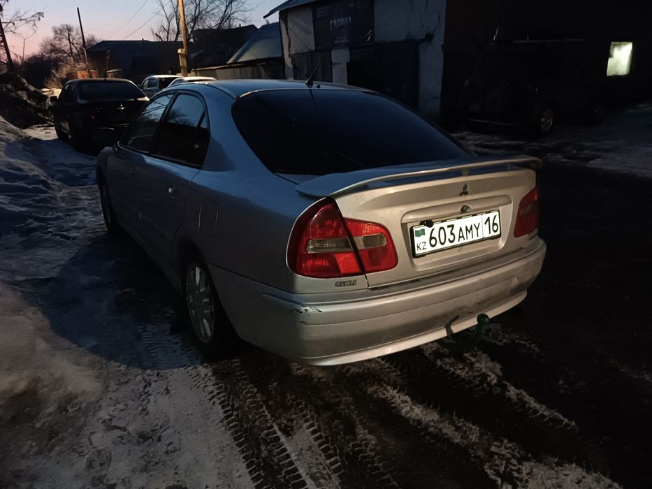 Митсубиси кариссм. В полный разбор