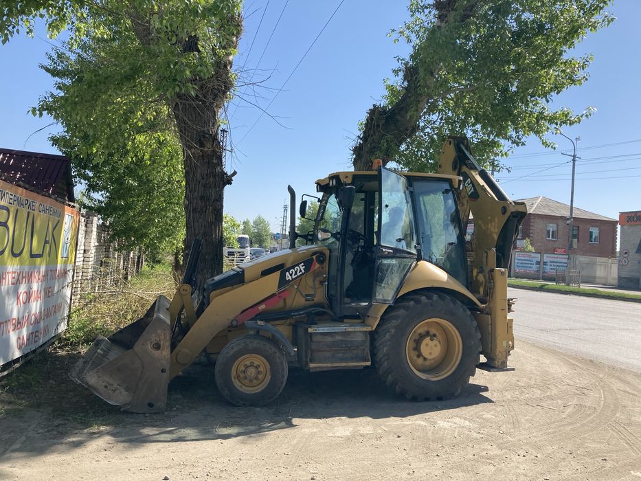 Услуги экскаватора- погрузчика CAT