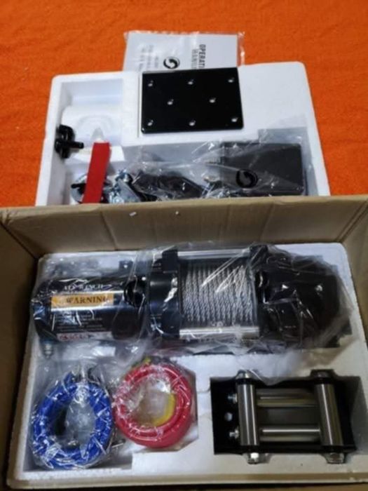 Troliu electric 12 Volți 2300 KG.15 metri cablu.Nou.