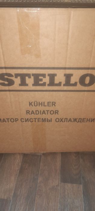 Радиатор охлаждения мазда3 2006год