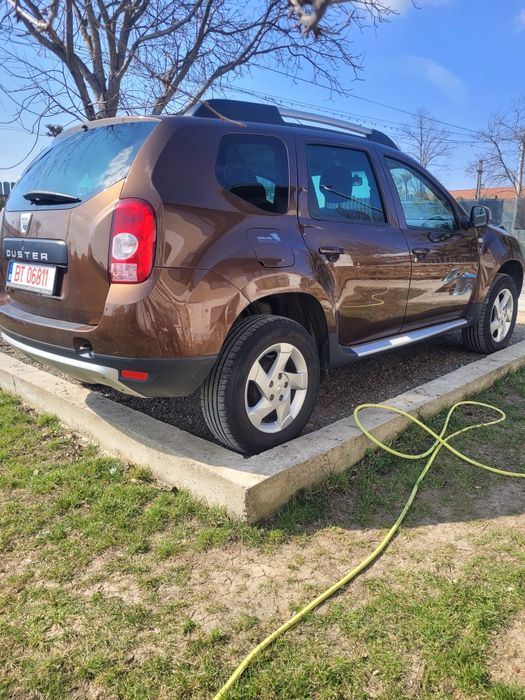 Dacia Duster 1.6 benzina , an fab 2011
