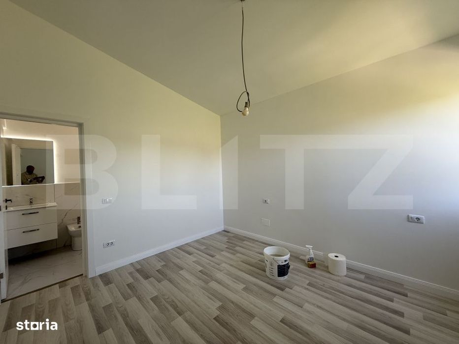 Casa pe parter cu un design deosebit, zona nordica / Simnicul de Jos