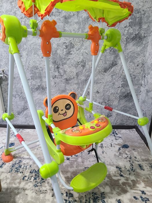 Детские качели с музыкой