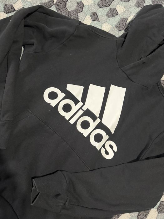Слуичър на  Adidas
