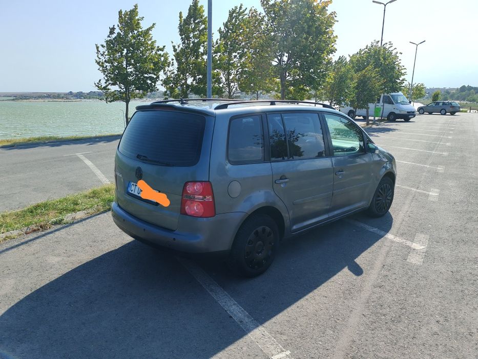 Volkswagen Touran 1.6 benzina și gpl 1250 e.