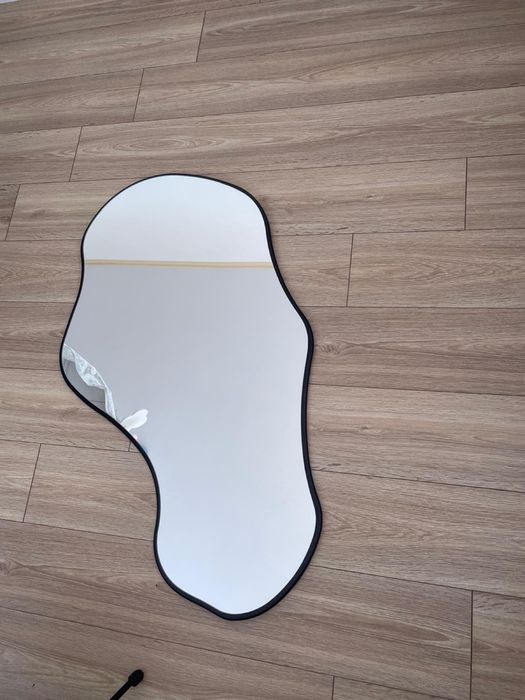 Асиметрично ефектно огледало