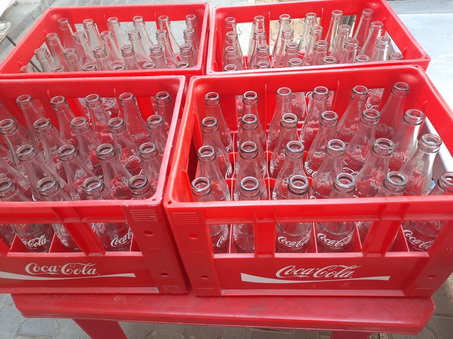 Кока-кола тара бор бутилкаси билан