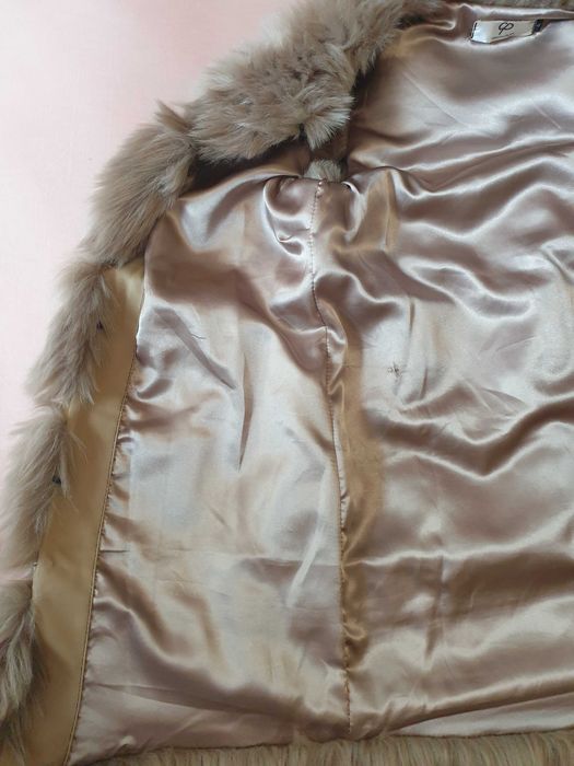 Дамски луксозен пухен елек