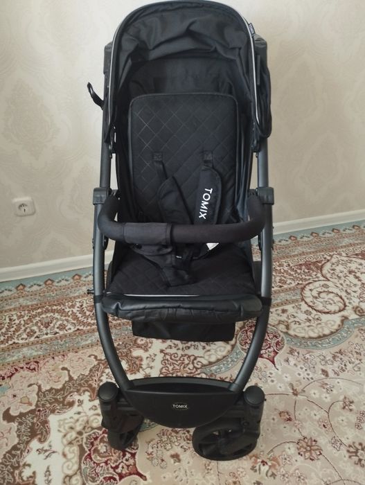 Продам коляску Tomix оригинал в отличном состоянии