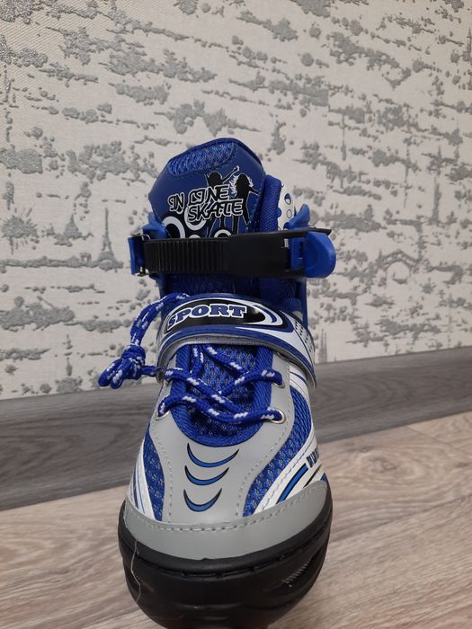 Роликовые коньки