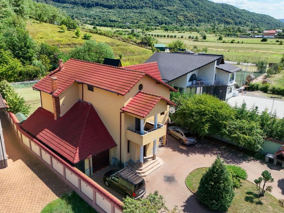 Casă de vânzare – 110 mp, curte spațioasă și grădină verde