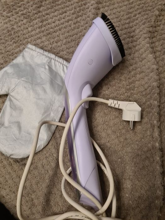 Aparat de calcat vertical cu aburi Philips
