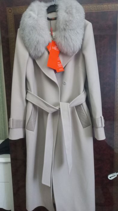 Продам пальто новое