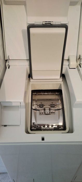 пералня с горно отваряне Миеле