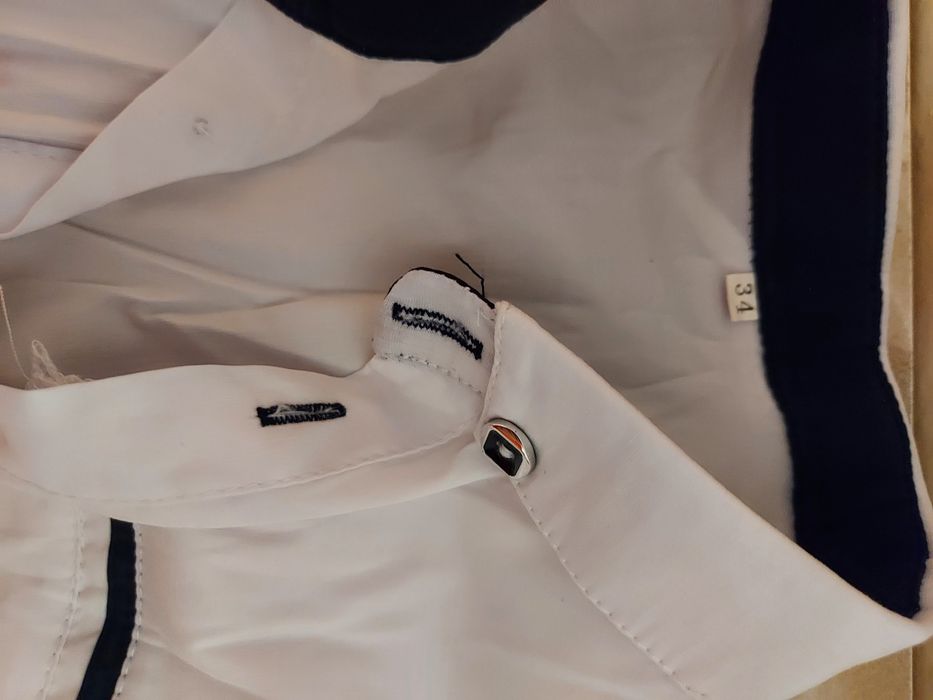 Рубашки школьные.