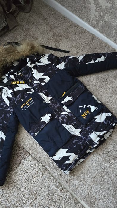 Продам зимнию куртку на мальчика