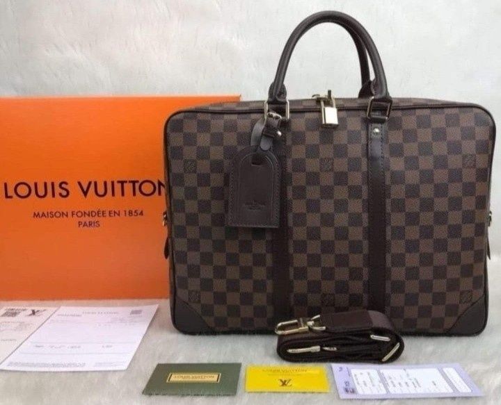 Genti LV laptop,model unisex, curea reglabila,saculet, etichetă