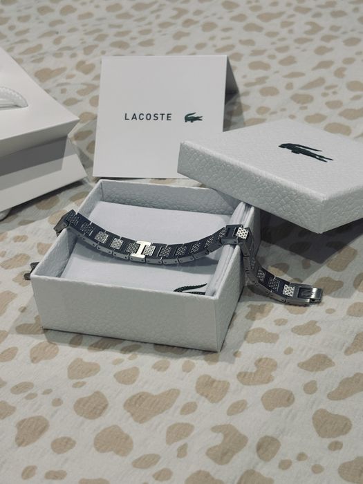 гривна   Lacoste