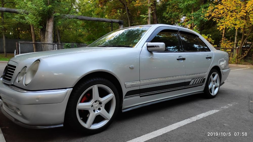 Бампер передний Mercedes 210 E 55 AMG