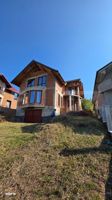 Teren 10 ari cu casa la rosu 240 mp cu plus garaj–Valea Rusului, pan