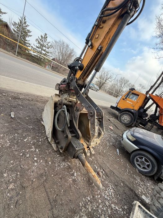 Услуги колесного экскаватора